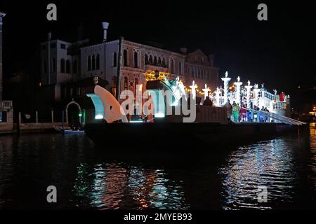 Carnival of Venice: the parade of dreamers glides along the waters of the Grand Canal amidst fire, dance, music and acrobatics. They are the magical creatures, the voices, the dancing bodies of the dancers and acrobats who this evening kicked off the official opening of the Venice Carnival 2023 'Take Your Time For The Original Signs'. A majestic floating stage, with some scenography from operas staged at the Teatro La Fenice, crossed the waters of the most famous canal in the world to give life to a performance, 'Original Dreamers', which captivated the audience. An hour-long journey, from the Stock Photo