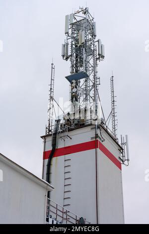 ower, mast with mobile phone transmitters, 2G, 3G, 5G. Antennas-2 Stock Photo