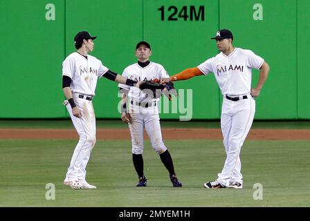 Christian Yelich, Ichiro Suzuki, Giancarlo Stanton (Marlins), MAY 19, 2015  - MLB : (L-R) Christian Yelich, Ichiro Suzuki and Giancarlo Stanton of the  Miami Marlins are senn during the Major League Baseball