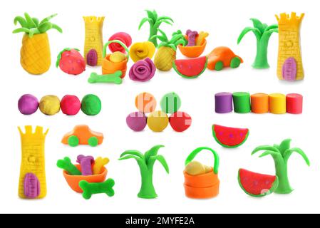 Collection of small figures made from play dough on white background Stock Photo