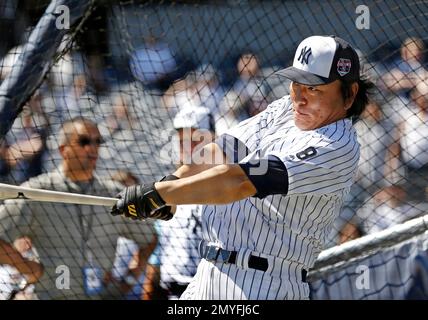 Former New York Yankees outfielder and 2009 World Series MVP Hideki Matsui  watches from the dugout during Yankees 68th Annual Old-Timers Day at Yankee  Stadium in New York, Sunday, June 22, 2014. (AP Photo/Kathy Willens Stock  Photo - Alamy