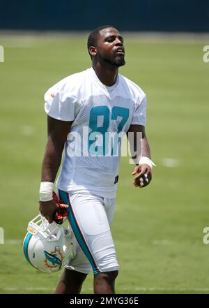 Miami Dolphins wide receiver Rashawn Scott (87) does drills at the