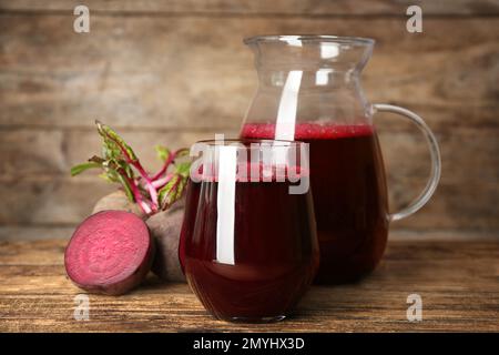 Freshly made beet juice on wooden table Stock Photo