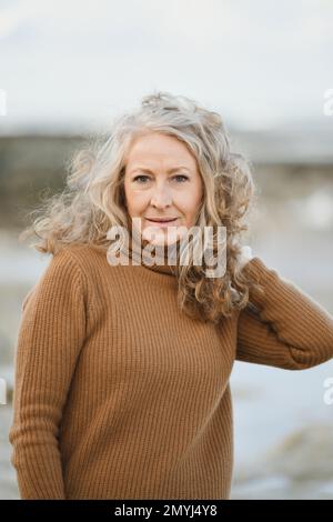 Portrait of a fifty-year-old woman with a gray hair Stock Photo