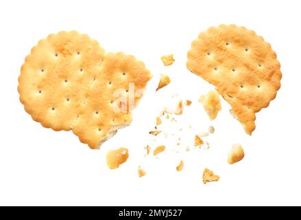Crushed cracker and crumbs on white background Stock Photo