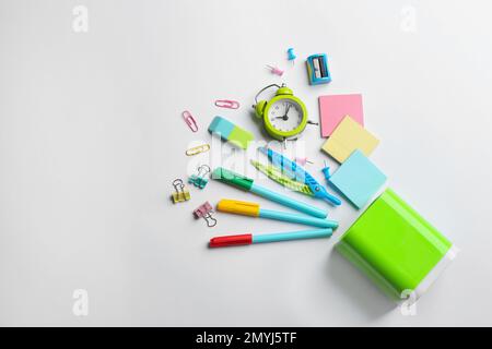 Flat lay composition with school stationery on white background, space for text. Back to school Stock Photo