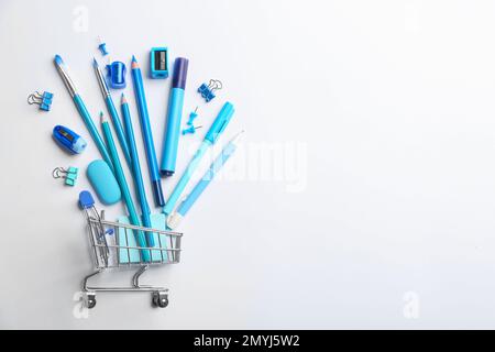 Flat lay composition with school stationery on white background, space for text. Back to school Stock Photo