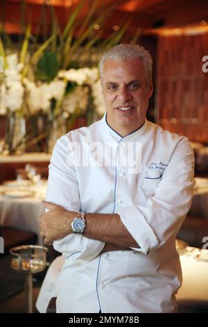 Le Bernardin chef Eric Ripert (2r) poses during 'The World's 50 Best Restaurants' gala at the