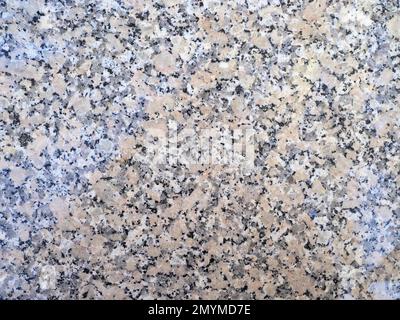 Structure of a polished granite slab Stock Photo