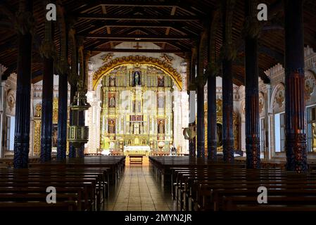 Illuminated interior of the cathedral at night, San Ignacio de Velasco, Santa Cruz Department, Bolivia, South America Stock Photo