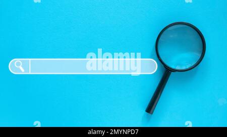 Magnifying glass with a search bar icon. Stock Photo