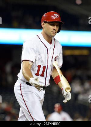 Washington Nationals' Ryan Zimmerman (11) heads for first base with a walk  against the Detroit Tigers