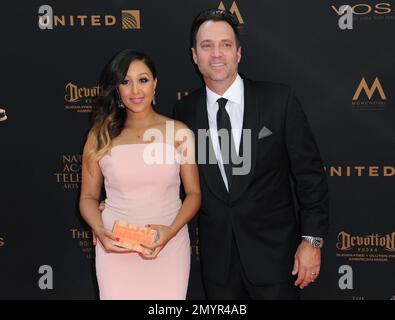 Tamera Mowry, left, and Adam Housley arrive at the 43rd annual Daytime Emmy Awards at the Westin Bonaventure Hotel on Sunday, May 1, 2016, in Los Angeles. (Photo by Richard Shotwell/Invision/AP)