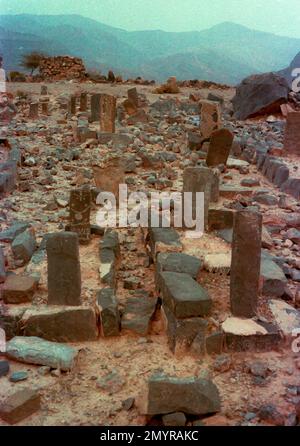 Grave sites at a remote mountain village abandoned by the Shihuh tribe, who have been lured down to the coast by the promise of water, schools and clinics. Musandam Peninsula, Oman Stock Photo