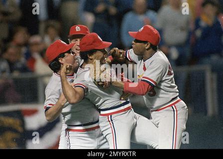 Home plate umpire Don Denkinger (11) keeps Toronto Blue Jays manager Cito  Gaston in place as Tim Tschida, middle, steers fellow umpire Jim Joyce away  following a bench clearing brawl with the