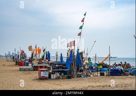fishing accessories, tools and nets. Fishing nets collected on sand beach.  big bale of fishing nets. fishing nets on the beach Stock Photo - Alamy