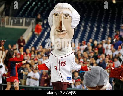 Washington Nationals' mascot Thomas Jefferson runs the warning track in  between innings as the Washington Nationals play the Philadelphia Phillies  at Nationals Park in Washington on April 13, 2009. (UPI Photo/Kevin Dietsch