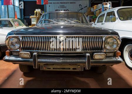 ZELENOGORSK, RUSSIA - JANUARY 27, 2023: Front part of the soviet car GAZ-24 Volga close-up. Museum of retro cars 'Horsepower' Stock Photo