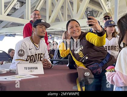 San Diego Padres' Yu Darvish, left, poses for a photo with his wife Seiko  Darvish at a baseball news conference, Friday, Feb. 10, 2023, in San Diego.  Darvish signed a new contract