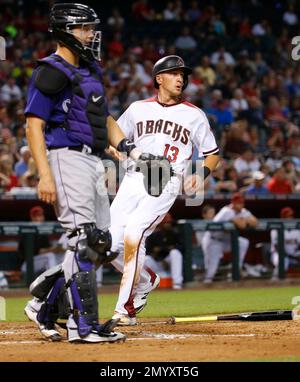 Arizona Diamondbacks' Nick Ahmed fields the ball against the St. Louis  Cardinals during the first inning of a baseball game, Tuesday, July 25,  2023, in Phoenix. (AP Photo/Matt York Stock Photo - Alamy