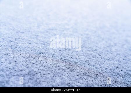 Surface covered with a layer of ice with a shallow depth of field Stock Photo