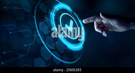 Validation concept for business process automation, quality assurance management, certification, digital transformation. Finger touching checked icon Stock Photo
