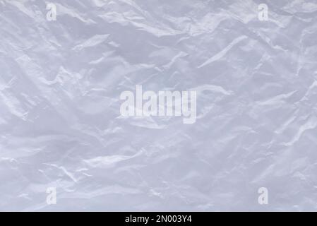 White and crumpled plastic bag background and texture. Stock Photo