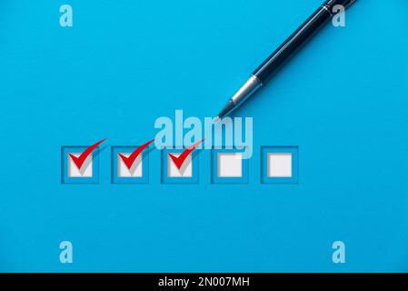Concept of tracking a progress of a project. A checklist or task completion. Stock Photo