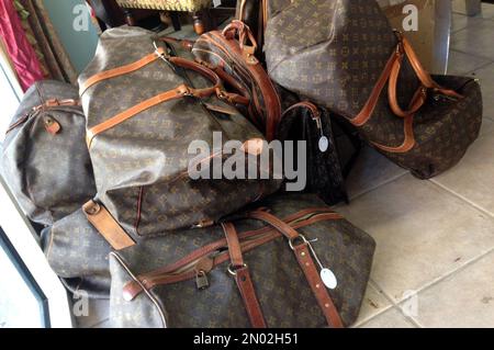 In this Feb. 25, 2016 photo, a variety of Louis Vuitton bags are