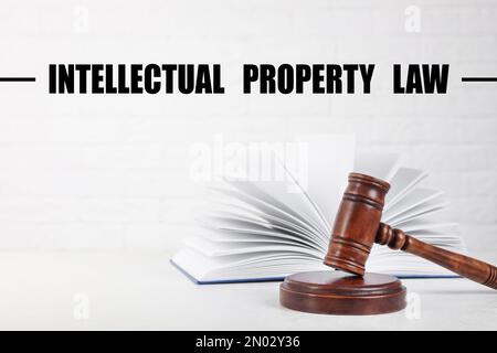 Text Intellectual Property Law over judge's gavel and book on table Stock Photo