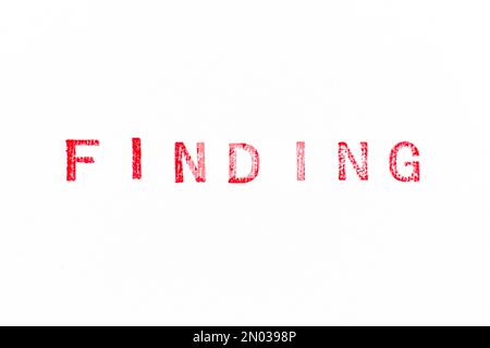 Red color rubber stamp in word finding on white paper background Stock Photo