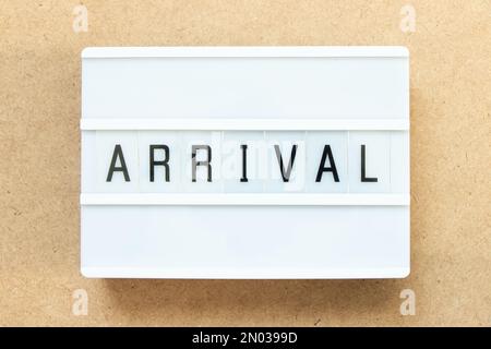 Lightbox with word arrival on wood background Stock Photo