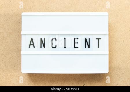 Lightbox with word ancient on wood background Stock Photo