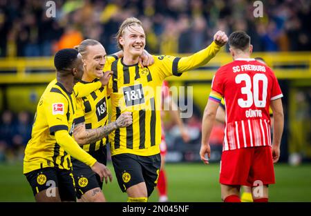 Dortmund, Germany. 4th Feb, 2023.  Torjubel: Youssoufa Moukoko (BVB), Marius Wolf (BVB), Julian Brandt (BVB) Borussia Dortmund - SC Freiburg Bundeslig Stock Photo