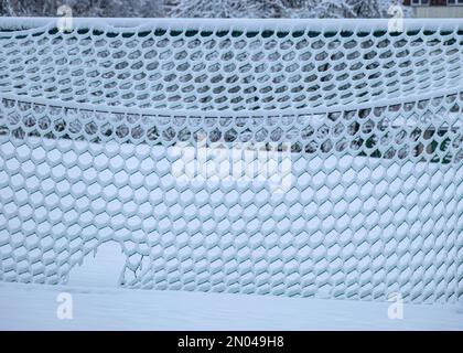 snow texture on snowy fence, winter texture, abstrac picture Stock Photo