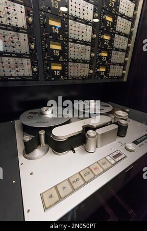 Vintage analog audio recording tape and other sound equipment in a  professional music recording studio Stock Photo - Alamy