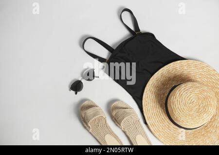 Composition with stylish beach accessories on white background, top view Stock Photo