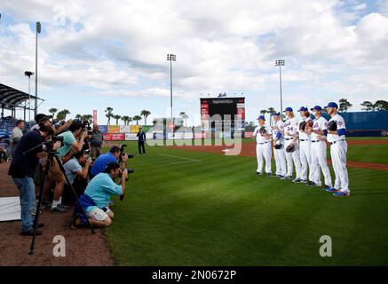 New York Mets pitchers Noah Syndergaard, Jacob deGrom and Matt Harvey (L to  R) walk in from the bullpen prior to playing the Los Angeles Dodgers in  game 4 of the NLDS