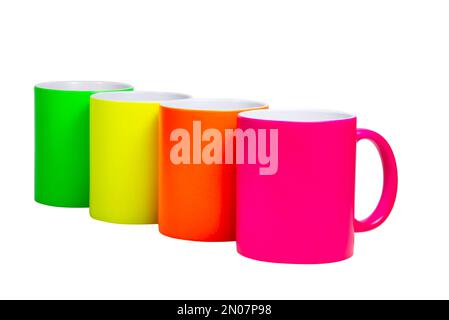 Multicoloe neon ceramic cups fot tea mug isolated on the white background Stock Photo