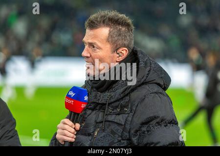 sports, football, Bundesliga, 2022/2023, Borussia Moenchengladbach vs. FC Schalke 04 0-0, Stadium Borussia Park, Sky expert Lothar Matthaeus with microphone in an interview, DFL REGULATIONS PROHIBIT ANY USE OF PHOTOGRAPHS AS IMAGE SEQUENCES AND/OR QUASI-VIDEO Stock Photo