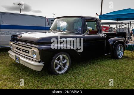 Daytona Beach, FL - November 26, 2022: High perspective front corner view of a 1962 Ford F100 Stepside Pickup Truck at a local car show. Stock Photo