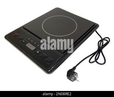 Induction cooker plate electric isolated on white background Stock Photo