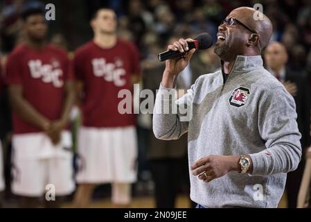 Darius Rucker, formerly of Hootie and the Blowfish, sings the national  anthem before the playoff game between the Miami Dolphins and the Baltimore  Ravens in Miami, Sunday, Jan. 4, 2009. (AP Photo/J.