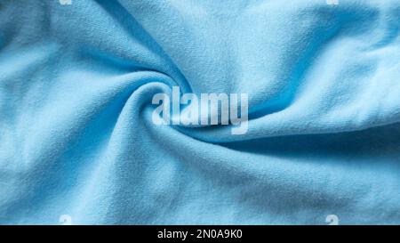 Textile and texture template. Blue cotton cloth fabric. Background. Stock Photo