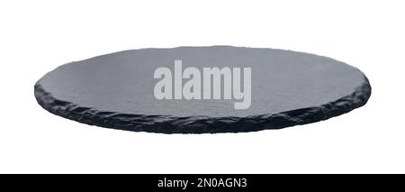 Selective focus of black slate round stone isolated on white background. Stock Photo