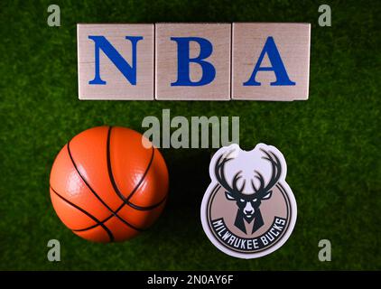 January 30, 2023, Springfield, USA. The emblem of the Milwaukee Bucks National Basketball Association club on the green lawn of the stadium. Stock Photo