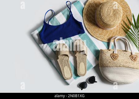 Composition with stylish beach accessories on white background, top view Stock Photo