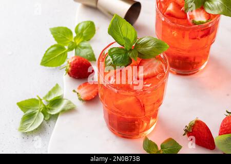 Strawberry basil cocktail or mocktail, cold refreshing summer drink Stock Photo