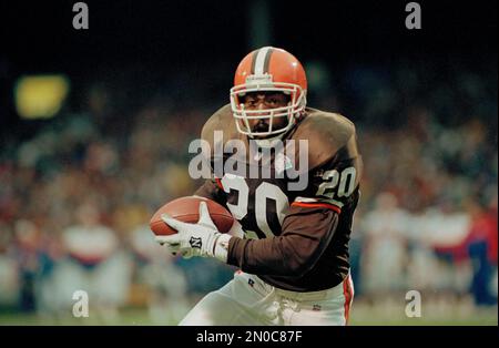 Cleveland Browns running back Earnest Byner (44) is hauled down in his  backfield by the New York Jets Marty Lyons (93) at his feet and Mark  Gastineau at his rear as Johnny