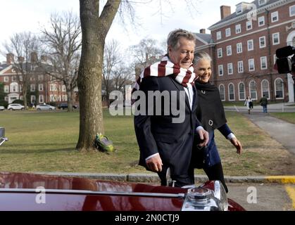 Actors Ryan O'Neal and Ali MacGraw walk on the campus of Harvard University in Cambridge, Mass., Monday Feb. 1, 2016, more than 45 years after the release of their 1970 classic 'Love Story.' The duo, now in their 70s, currently are co-starring in a national tour of 'Love Letters,' which is about a man and a woman who maintain contact over 50 years through notes, cards and letters. (AP Photo/Elise Amendola)